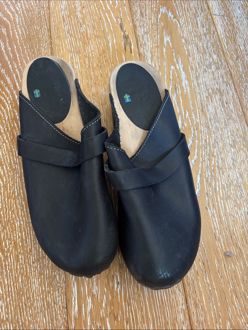 MIA Black Leather Slip-On Clogs